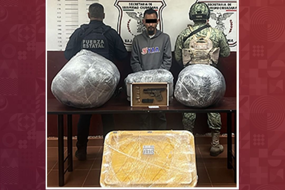 LO CAPTURAN ARMADO Y CON CARGA DE MARIHUANA 